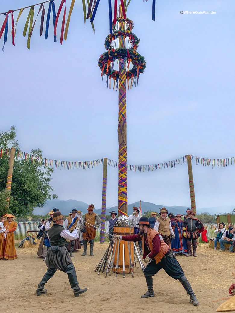 Sword fighting beneath the maypole