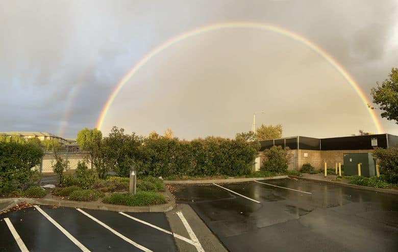A perfect full arch rainbow and double rainbow outside Los Angeles