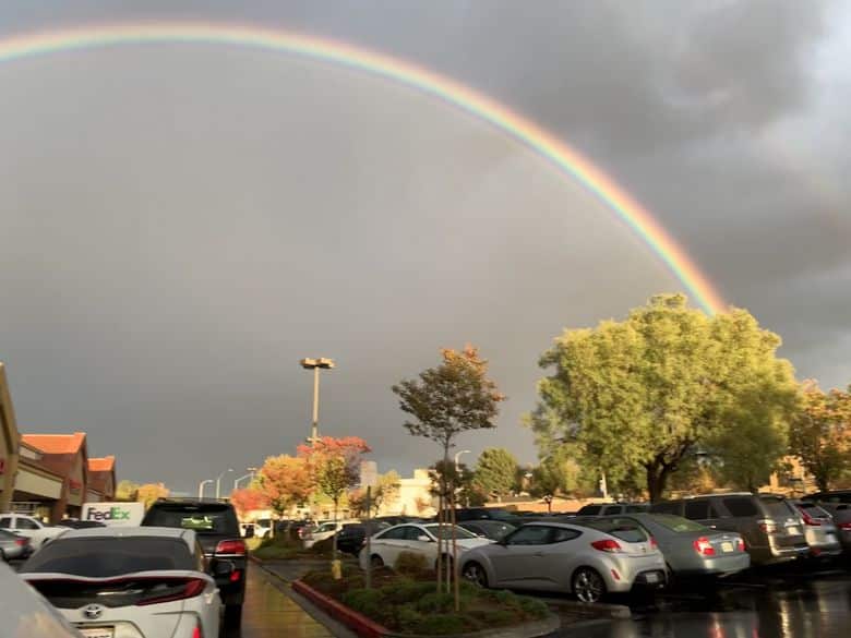 A perfect full arch rainbow and double rainbow outside Los Angeles